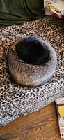 Top view showing black mink crown and raccoon brim