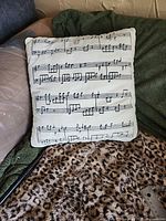 Front view showing printed sheet music design