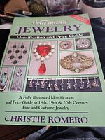 Front cover showing title, subtitle and jewelry images