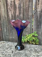 Full view of vase front showing ruffled rim and coloration