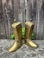 Front view of both brass cowboy boot bookends