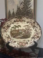 Front view of Tonquin oval platter on stand