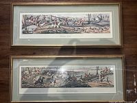 Front view of both framed prints showing artwork and frames