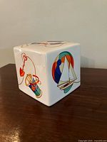 Oblique view of cube bank showing pail and shovel graphic