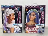 Both boxed Monster High wigs front view