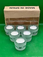 Six glass tealight holders with box marked Made in Spain