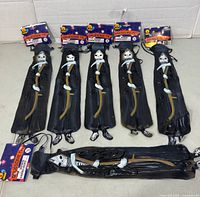 All six Rubie's glow ties laid out front view