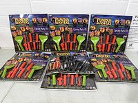 Six Pumpkin Masters tool kits laid out