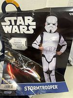 Retail package front showing Star Wars Stormtrooper costume, size child small 6-7