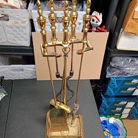 Full view of brass stand with tools