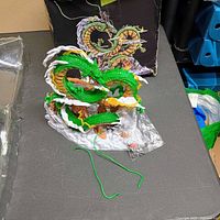 Dragon figurine with box in background