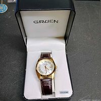 Front view of Gruen wristwatch in branded box
