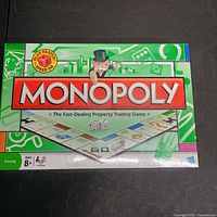 Front view of sealed Monopoly board game box