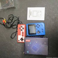 Console, controller, AV cable, manual and box laid out