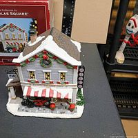 Front view of Ryan’s Bicycle Shop building with box