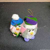 Front view of both Furby ornaments