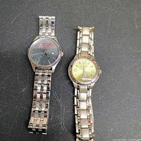 Front view of both wristwatches side by side