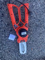 Full view of Black+Decker Alligator Lopper chain saw with cord