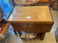 Full view of butcher block island showing top and frame