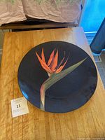 Front view of plate showing Bird of Paradise design