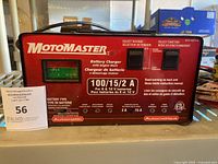 Front panel showing brand, model, output ratings and ammeter