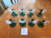 Top view of 8 Libbey cactus margarita glasses arranged on table