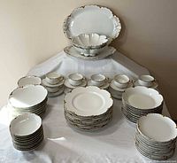 Full set displayed on table showing quantity and variety of pieces