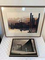 Both framed artworks together, showing relative sizes and framing.