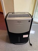 Front view showing full unit, colour, cord