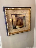 Front view of framed print showing artwork, mat, and frame details