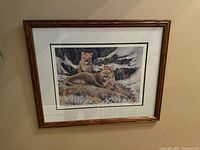 Framed RM Condon print on wall showing full piece