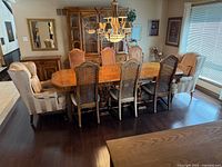 Dining table with all eight chairs around it