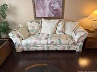 front view of Klaussner patterned sofa with cushions