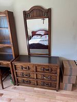 Front view of dresser with mirror above