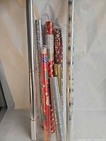 Group shot of all eight rolls standing upright