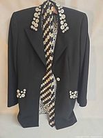 Full front view of blazer displaying white button appliqué and matching scarf