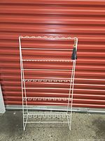 Full front view of white metal wire six-tier shoe rack