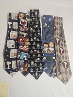 Front view of all six Peanuts silk neckties