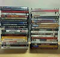 Two tall stacks of DVD keepcases showing all spines