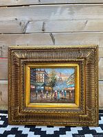 Front view of framed oil painting showing full artwork and frame