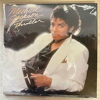 Front cover of Michael Jackson “Thriller” LP in plastic sleeve