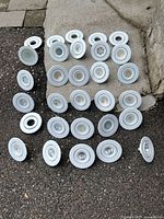 All recessed pot light trims lined on pavement