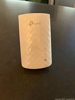 Front view showing TP-Link logo and status LEDs