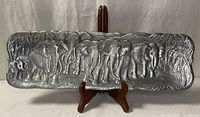 Full view of Arthur Court embossed aluminum elephant tray on stand