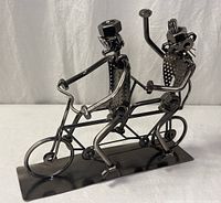 Front view of metal tandem bicycle sculpture