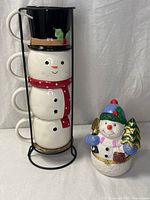 Mug tower and trinket box side by side