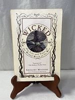 Front view of hardcover book on stand