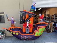 Full view of inflated pirate ship with skeleton figures