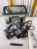 Bosch circular saw with cord, blade, wrench and bag
