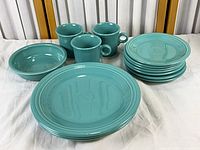 Full set showing plates, bowl, mugs